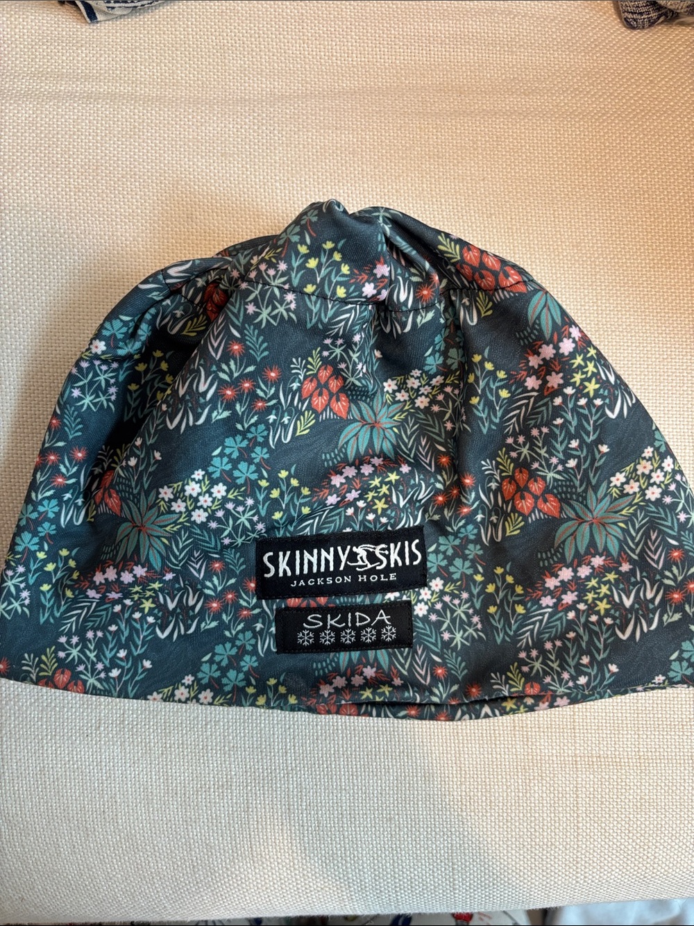 Skida Floral Beanie Hat in Dark Green by Skinny Skis